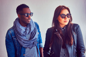 Fashionable man and woman wearing simplycasual clothingstore fashions.